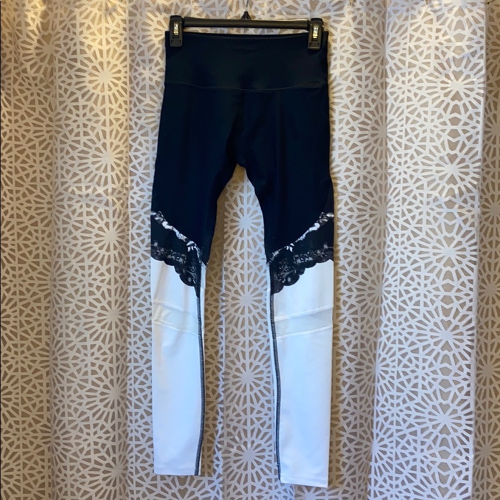 Worn Once. Workout leggings. With mesh at knees